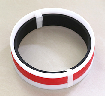 Complex drum-shaped ring (PU+black rubber+POM)