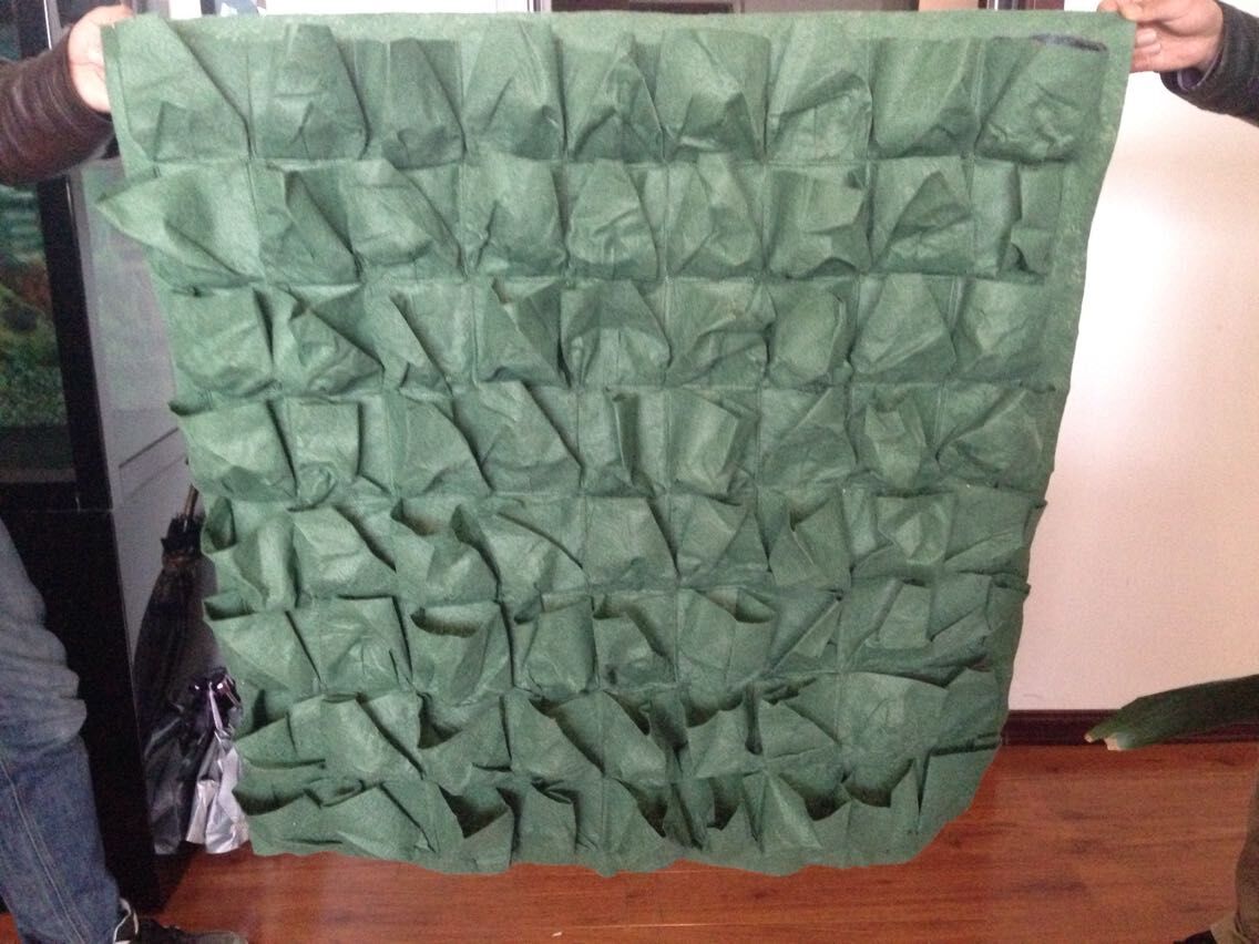 墙体垂直绿化袋是什么材料的，九洲生态袋厂家最新环保产品