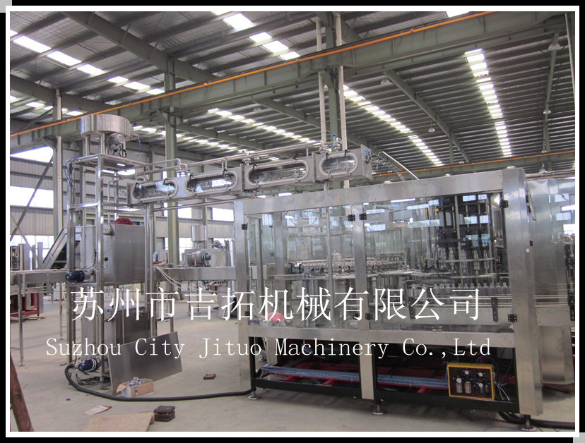果汁饮料热灌装三合一机，苏州市吉拓机械有限公司专业制造。