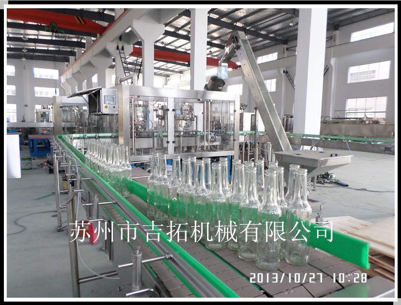 玻璃瓶啤酒三合一灌装机，苏州市吉拓机械有限公司专业制造。