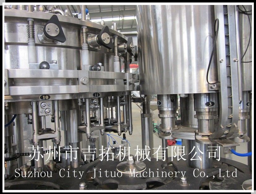 苏州市吉拓机械有限公司 专业制造啤酒三合一，二合一玻璃瓶灌装机