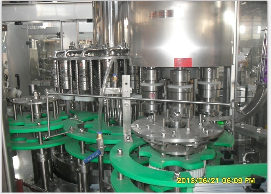 苏州市吉拓机械有限公司------玻璃瓶三、四旋盖生产线
