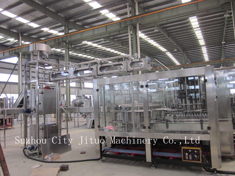 苏州吉拓机械全自动三合一热灌装生产线，质量品质有保证，服务满意，值得信赖！